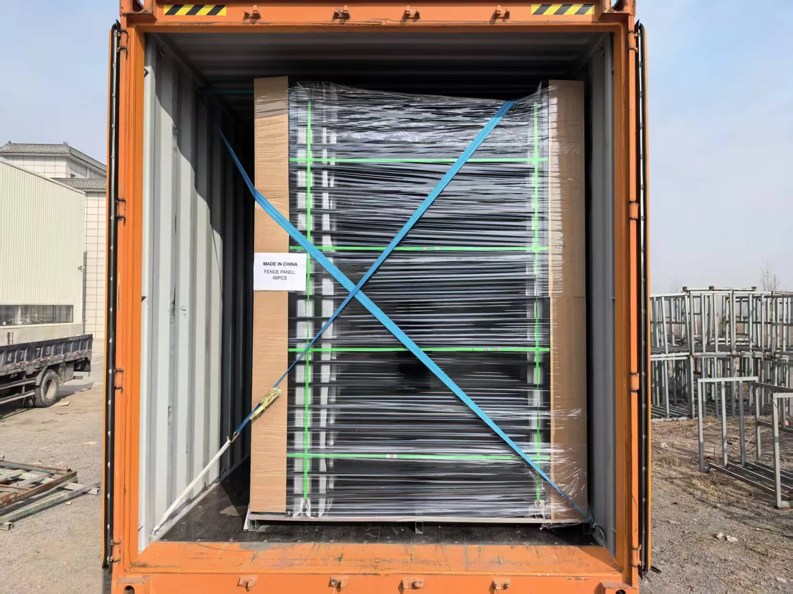 Pressed Top Steel Fence panels secured inside an export container for a U.S. distributor order