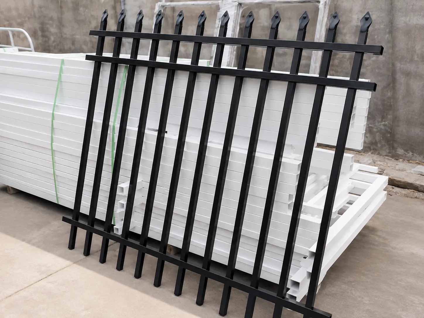 Finished black Pressed Top Steel Fence panel photographed at the factory