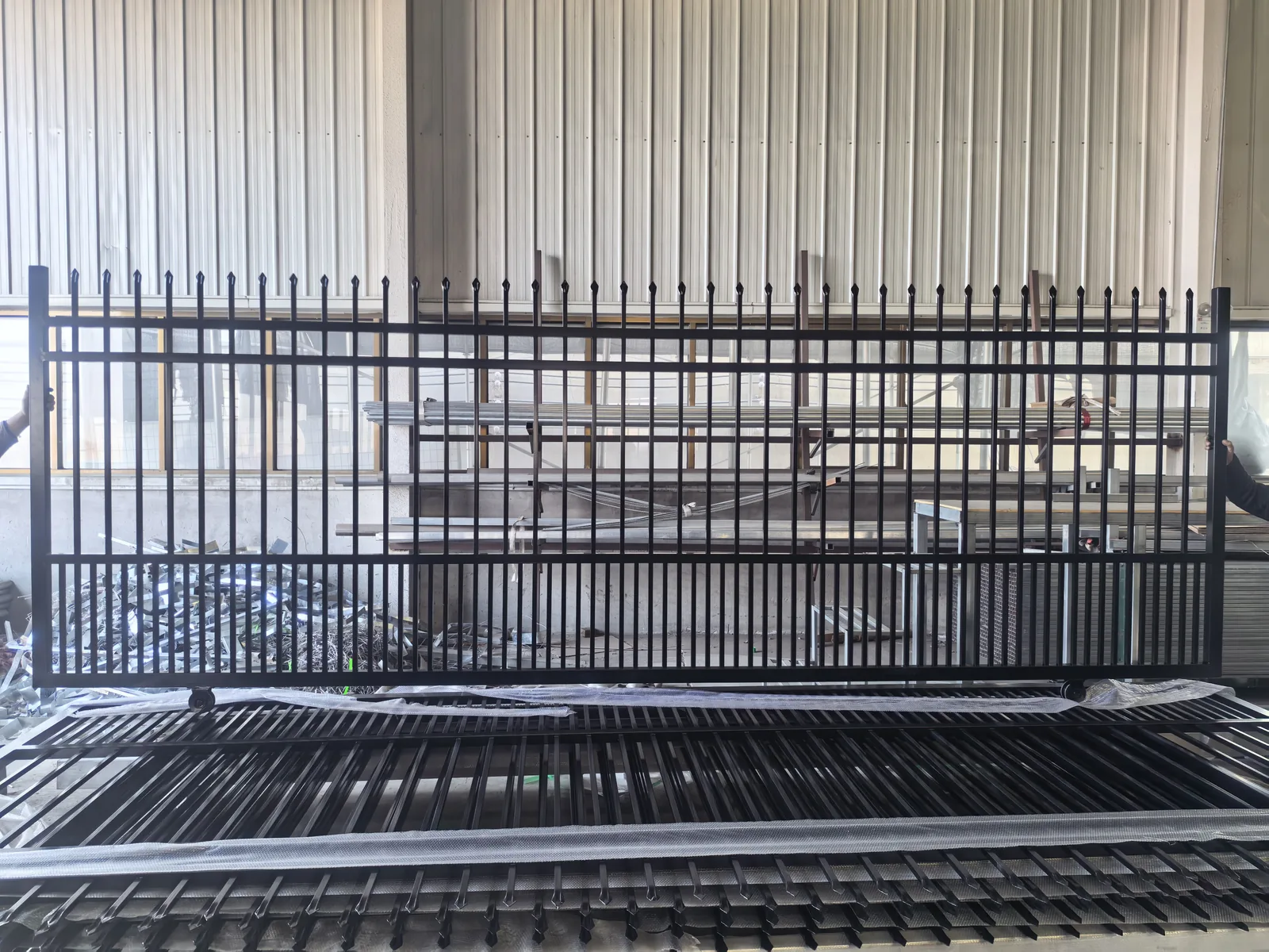 Custom sliding gate manufactured for the Pressed Top Steel Fence project