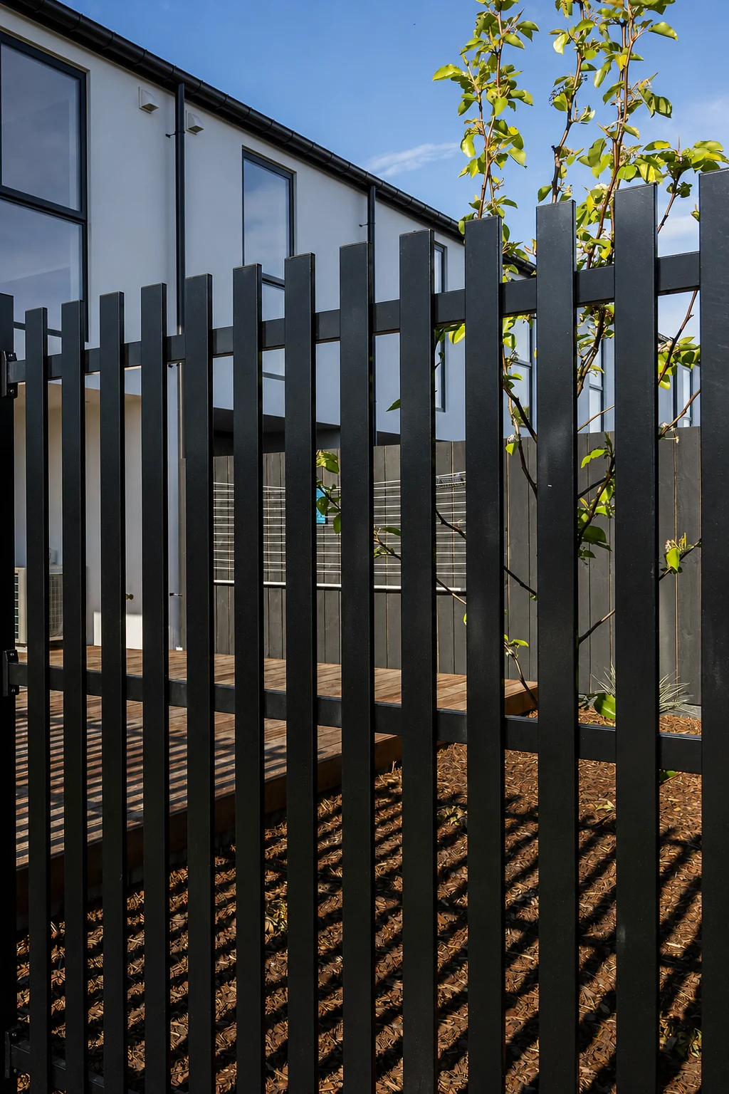 Close view of vertical flat bar fence details