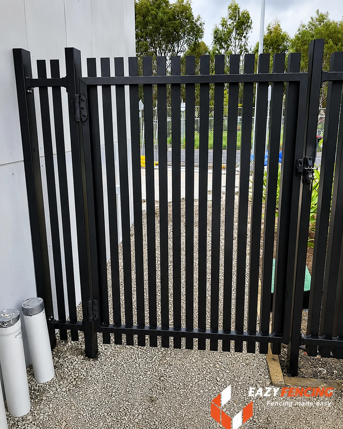 Vertical flat bar pedestrian gate