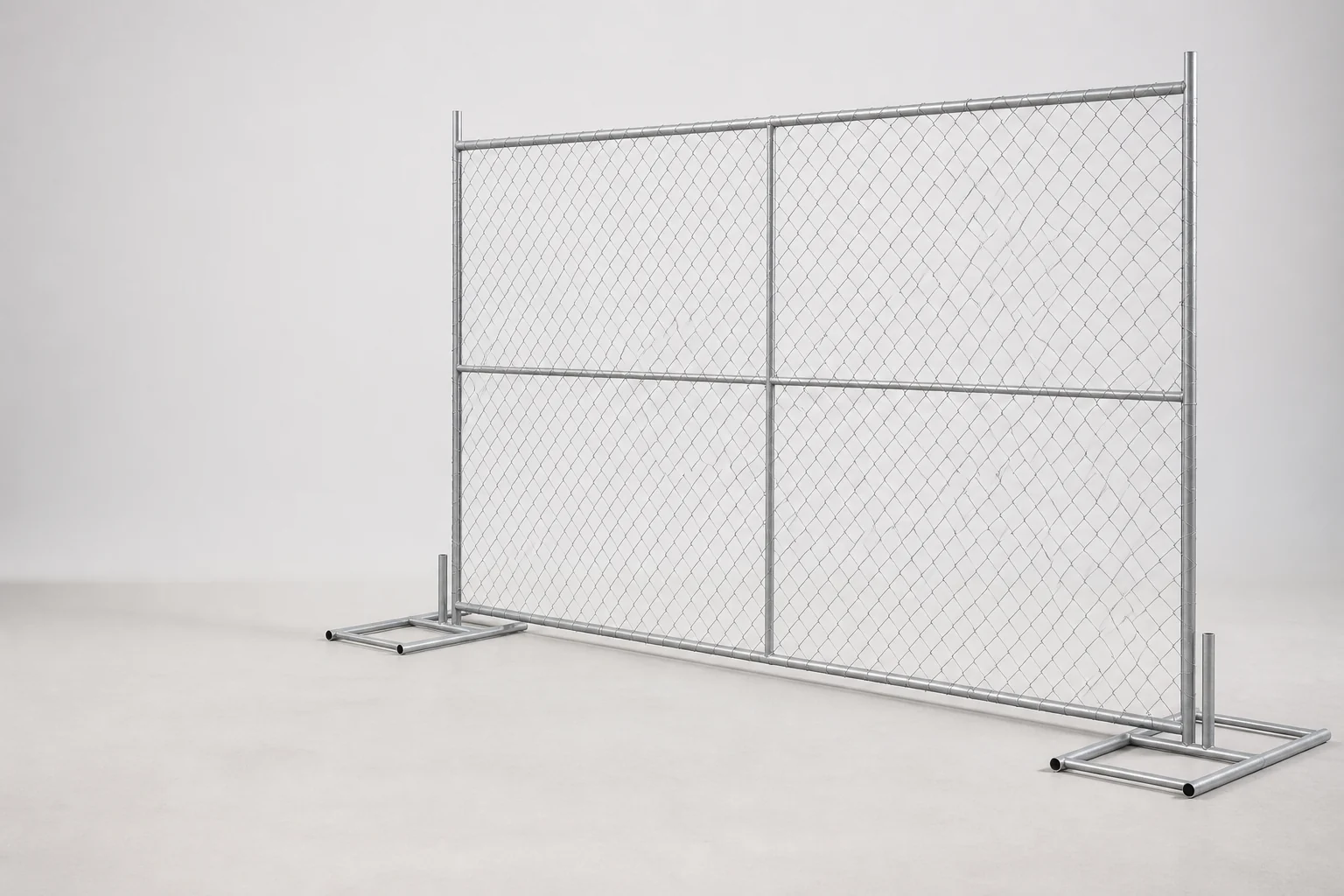 Temporary chain link fence panel with center reinforcement and twin-socket rectangular feet